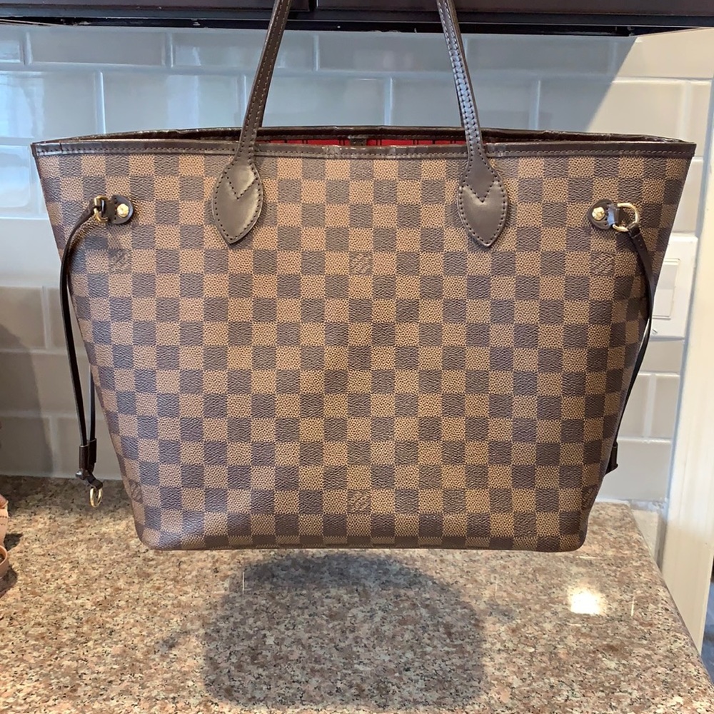 100 Authentic Luis Vuitton never full